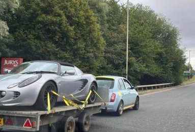 Nissan Micra towing a Lotus